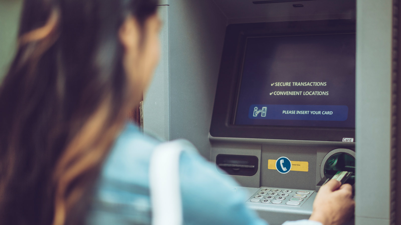 woman-atm-card-1600x900