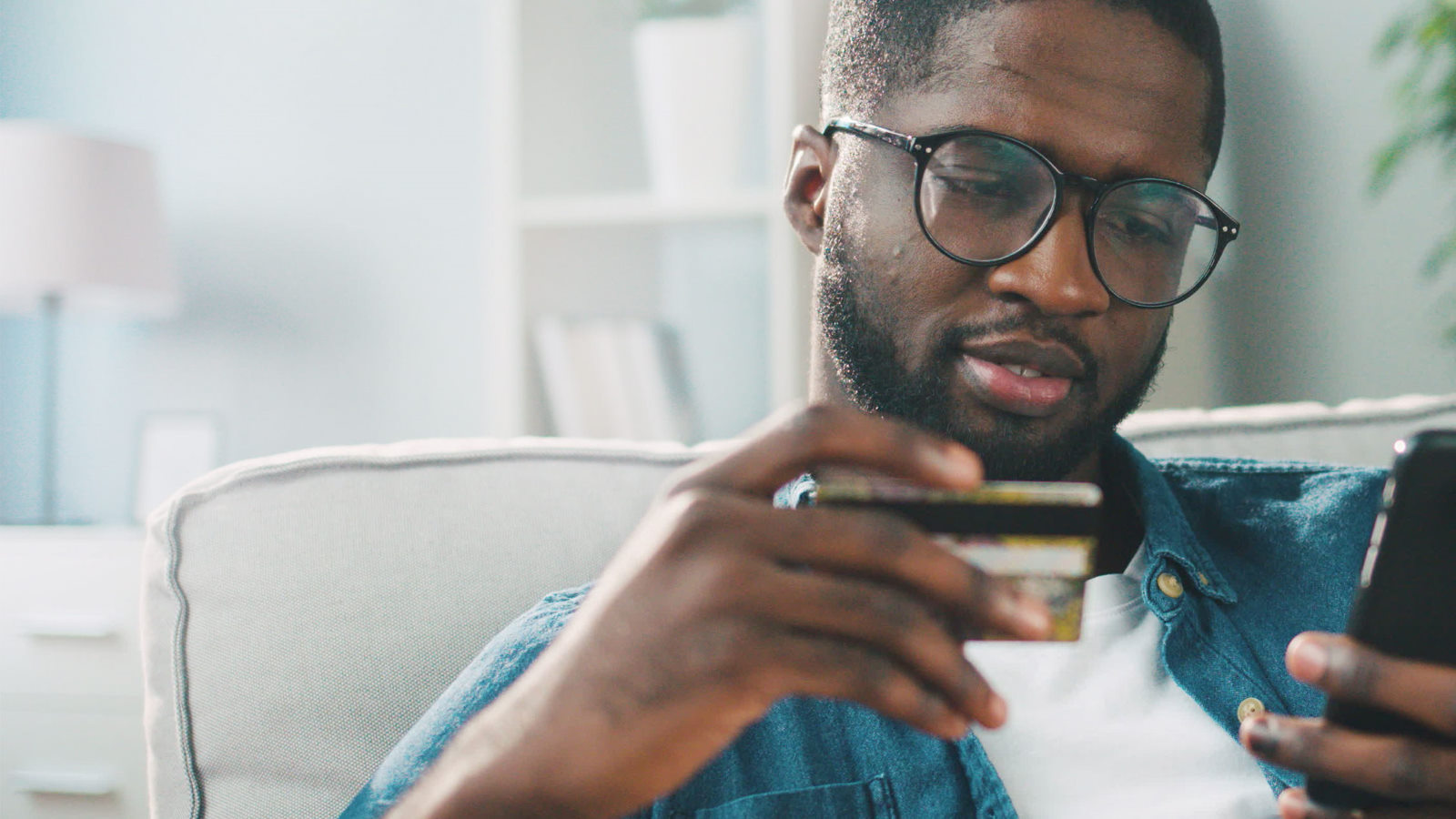 Person looking at card on phone
