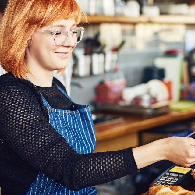 shopkeeper accepting card